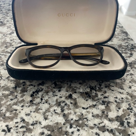 Brown colored Gucci frame with case. - Picture 1 of 4